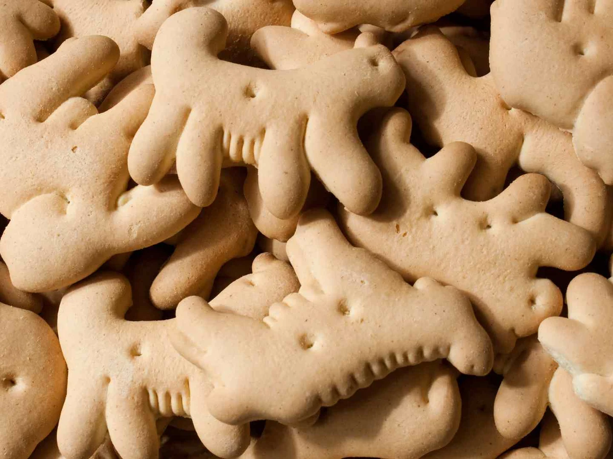A close-up pile of beige animal-shaped crackers.