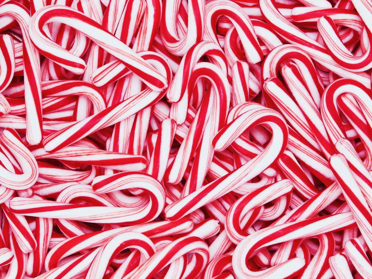 A dense pile of red and white candy canes