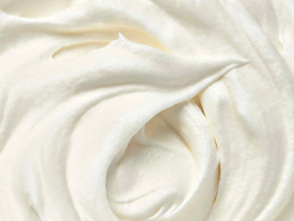 A close swirl of white whipped topping