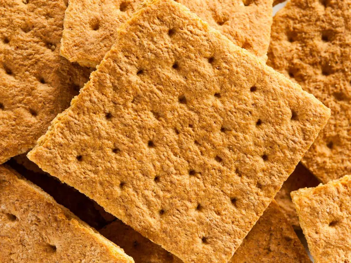 Broken and whole graham cracker squares filling the frame
