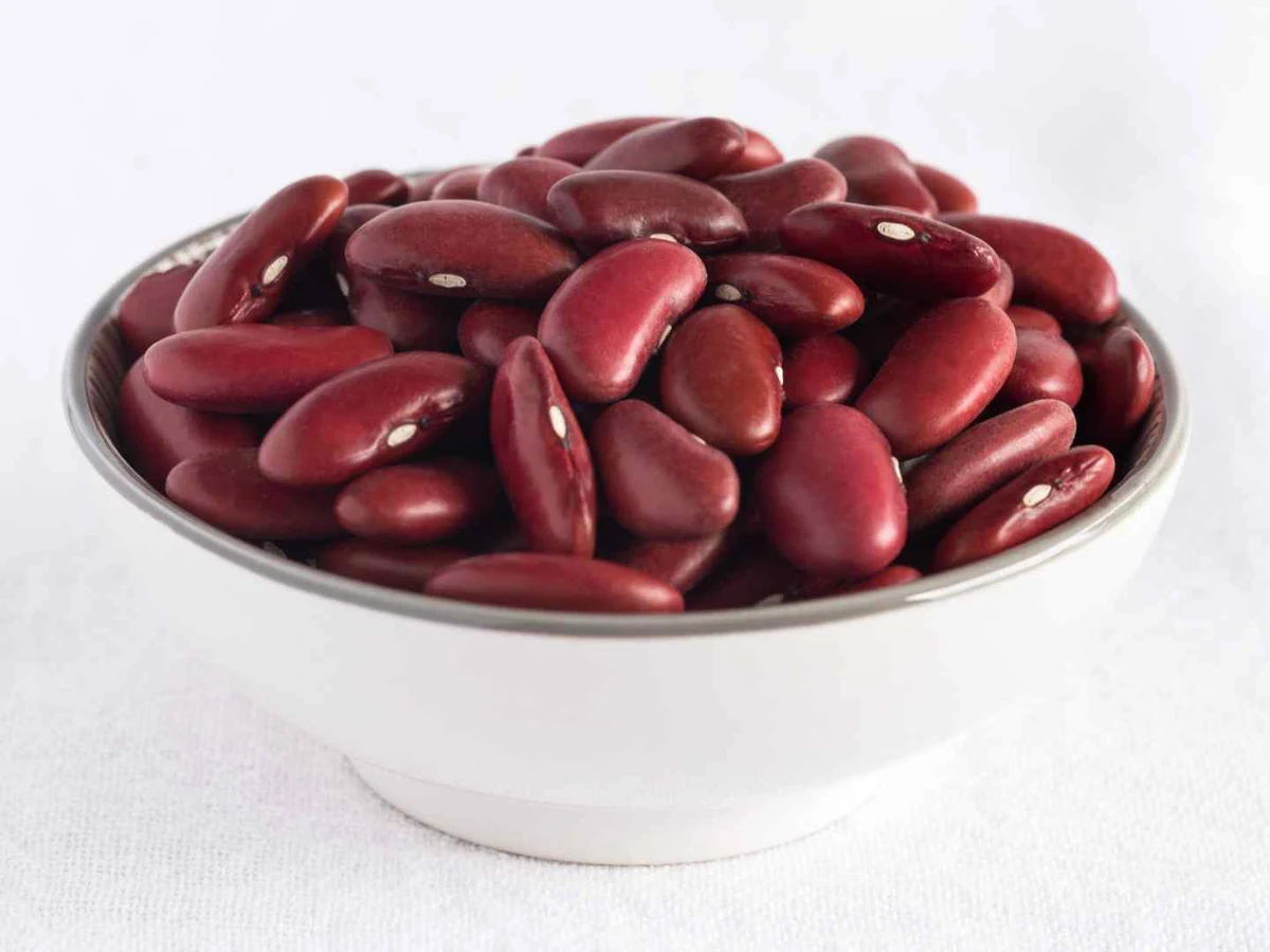 Dry red kidney beans filling the entire frame.