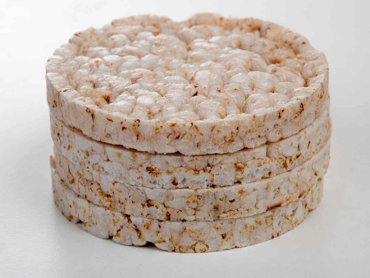 Small round rice cakes overlapping across the frame.
