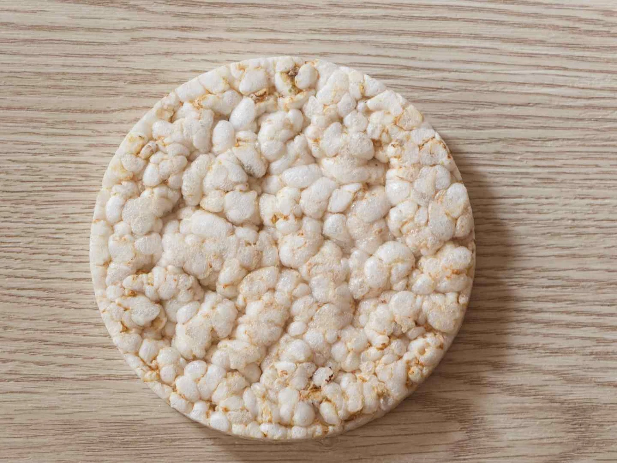 A short stack of round rice cakes on a white background.