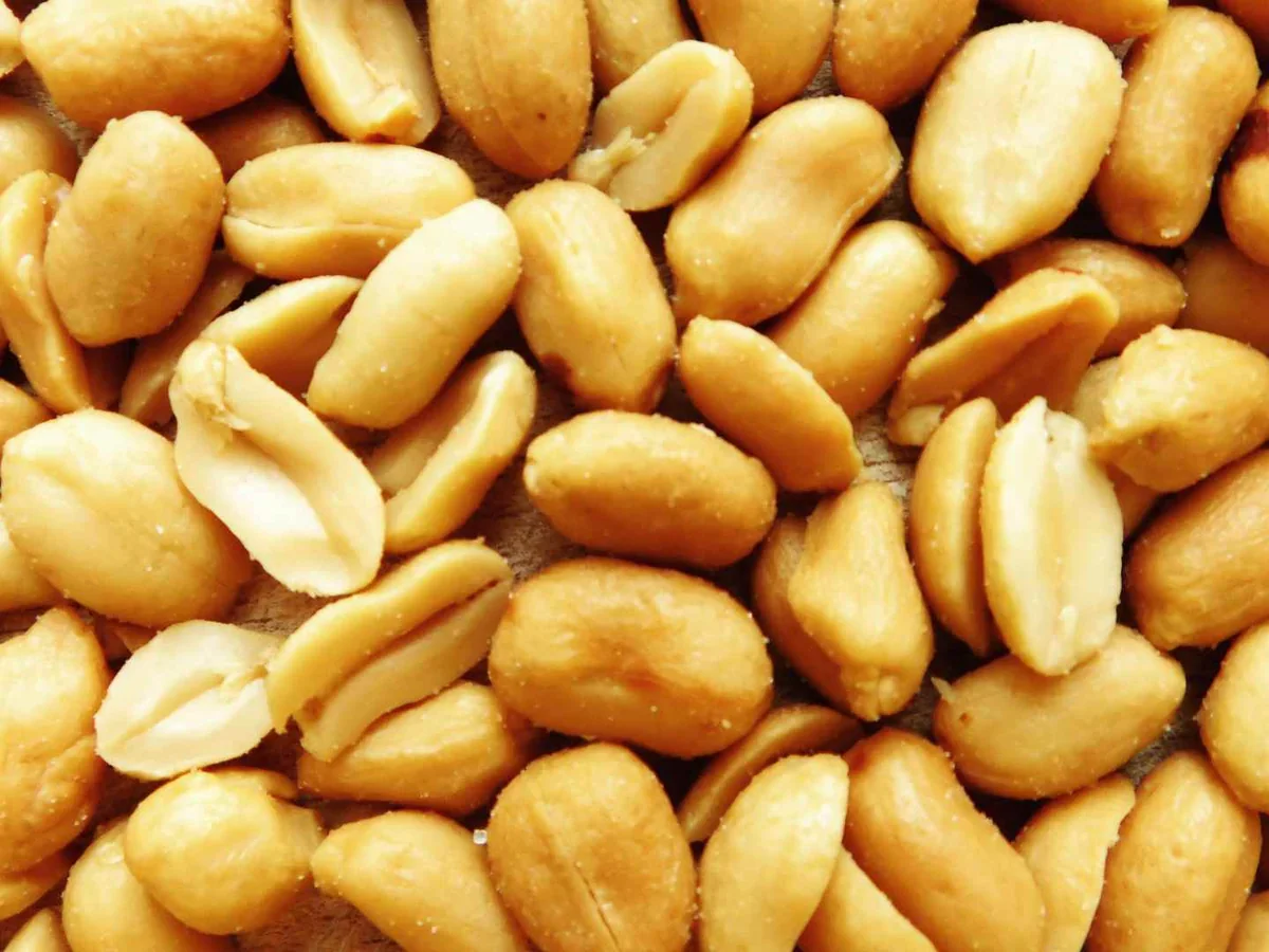 Close-up pile of shelled pale peanuts