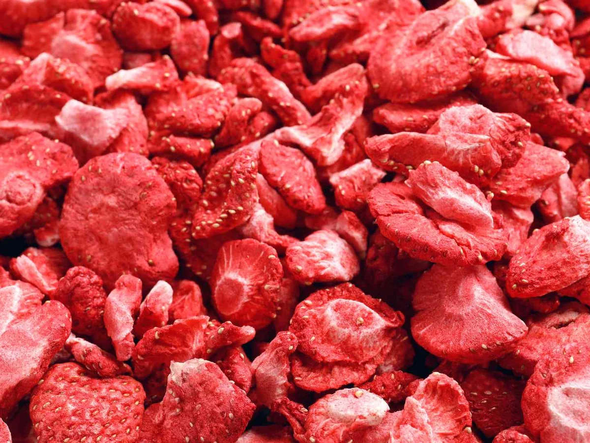 Close-up pile of freeze-dried strawberry pieces